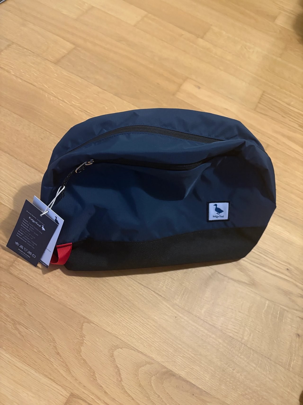 Front view of the blue KalgoTeal 8L wash bag