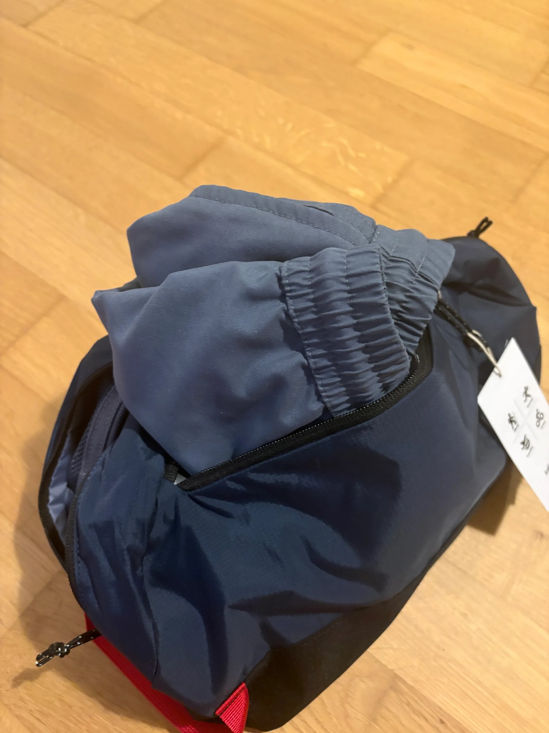 Wash bag opened up to show interior mesh pockets
